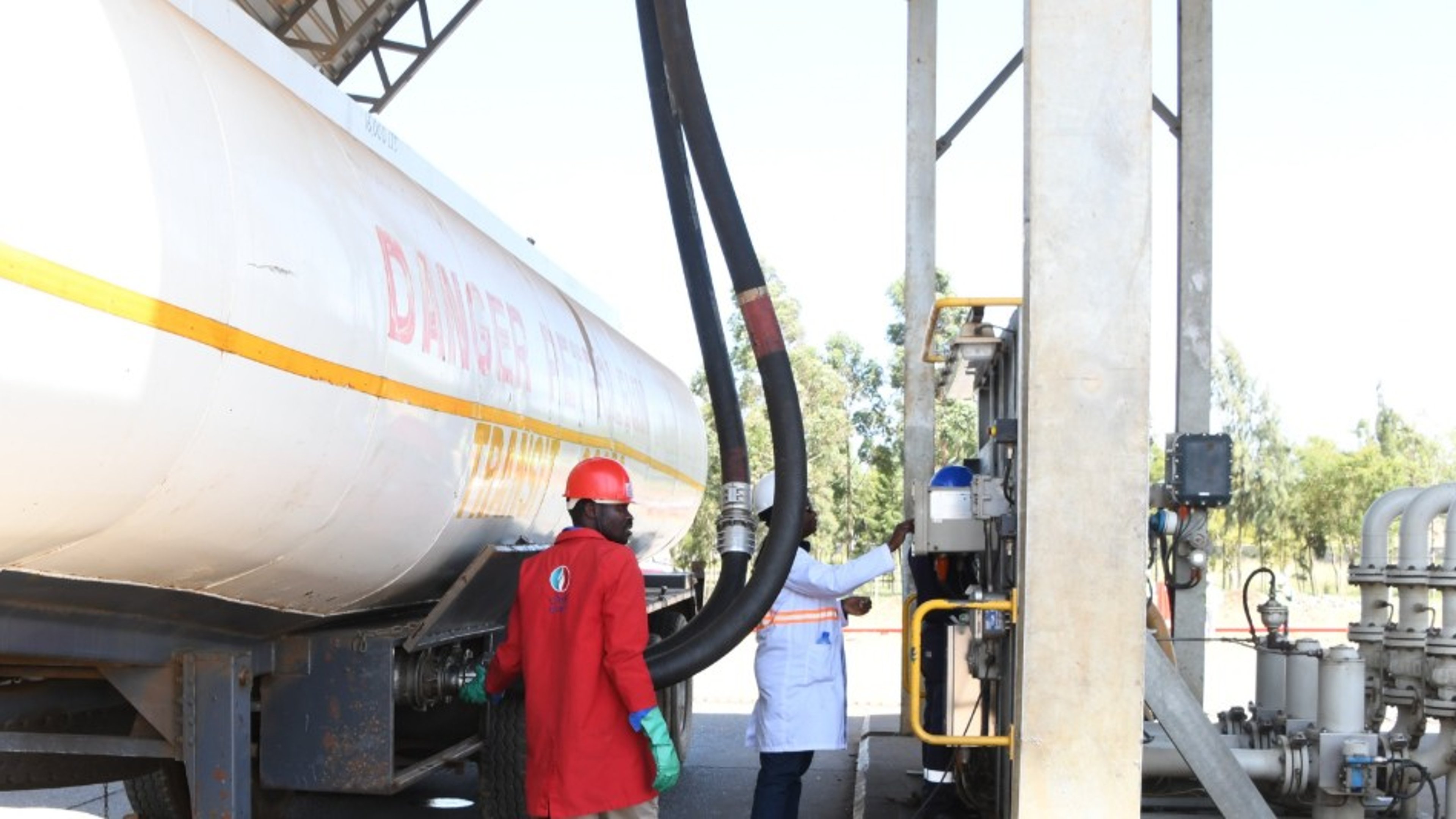 A fuel truck fueling at a filling station