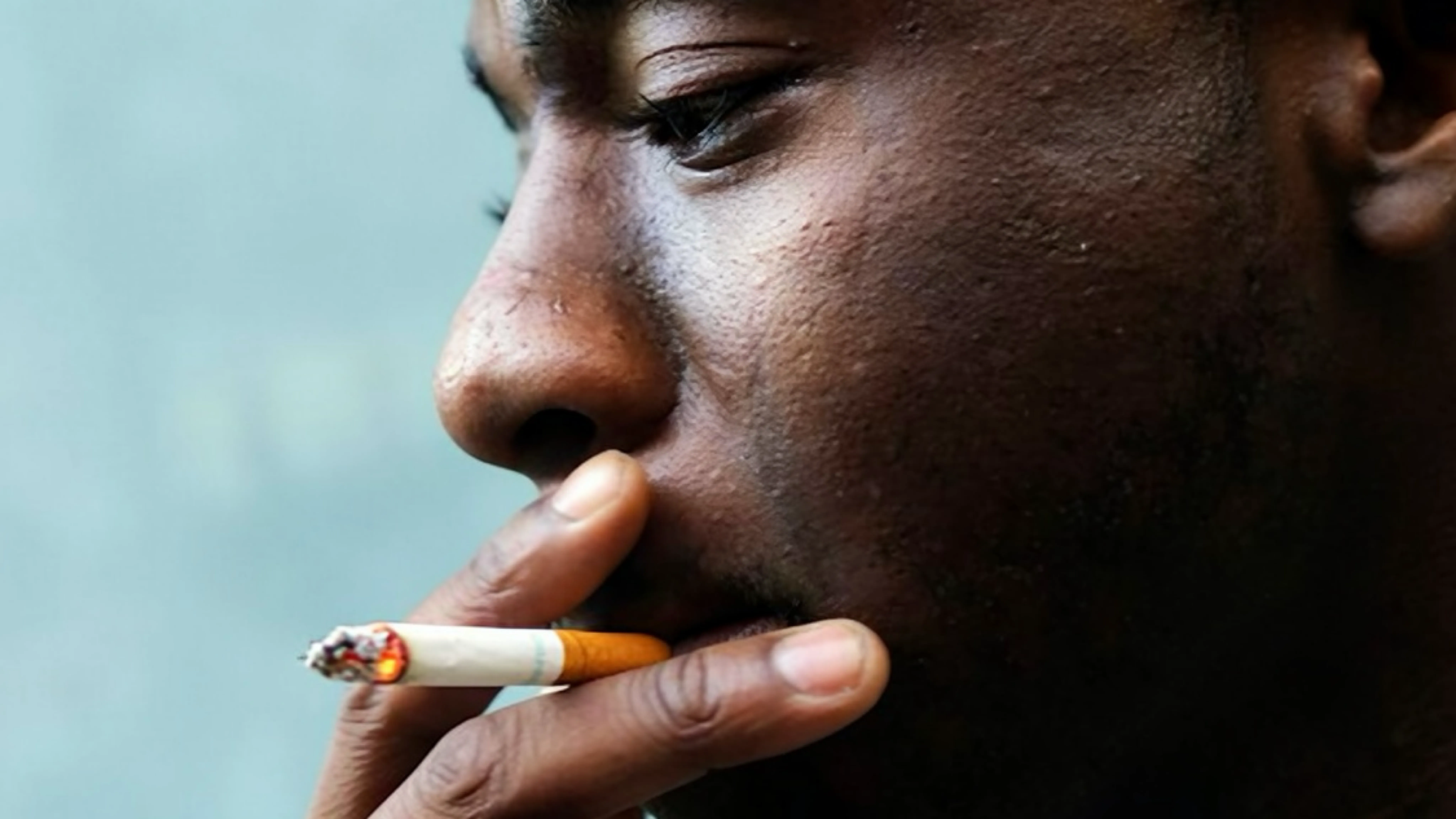 A man smoking cigarette: Bars and other entertainment spots owners want to cut the cost of implementing Tobacco Control (Amendment) Bill, 2024