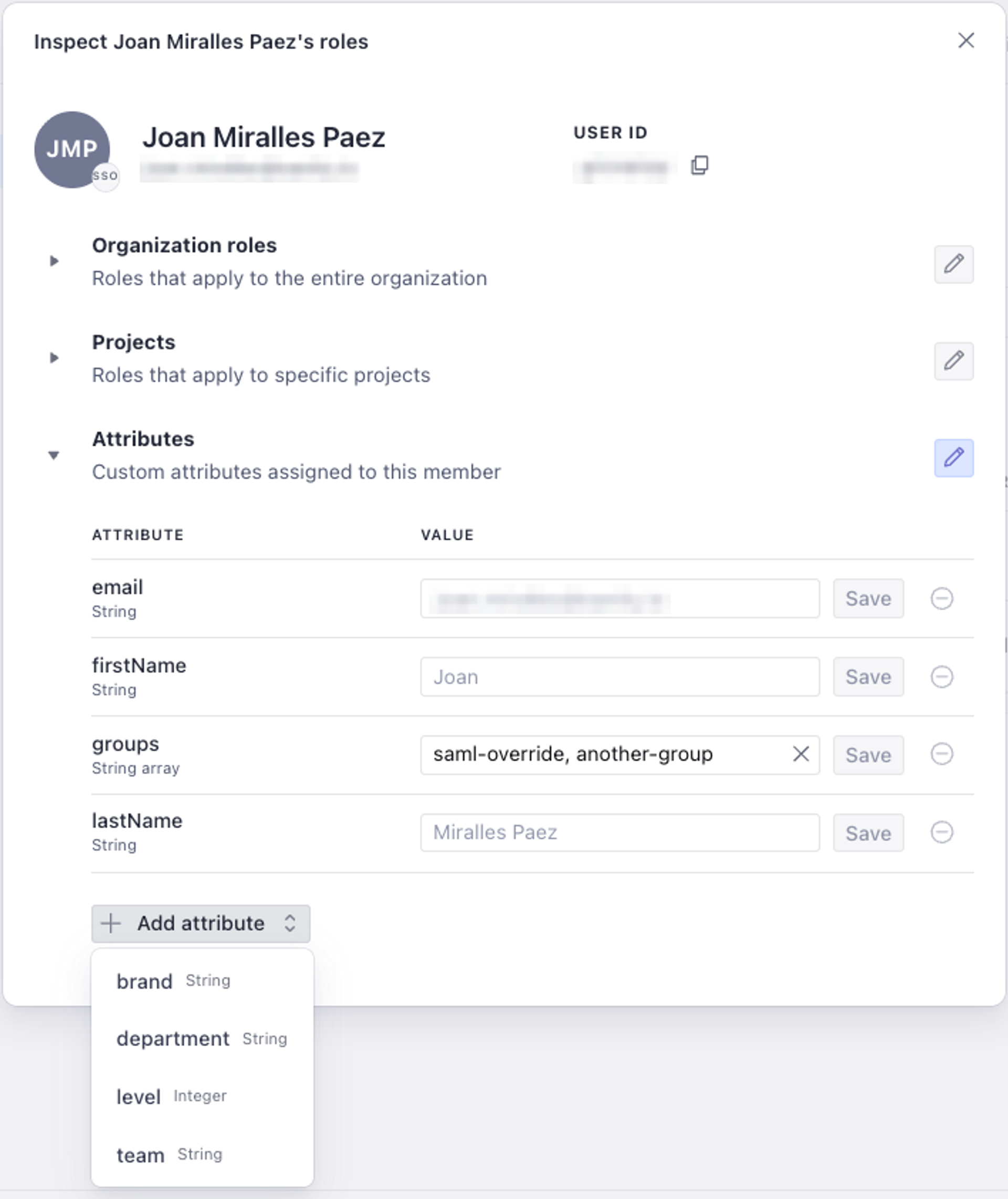 A user role inspection panel, showing editable attributes and an 'Add attribute' dropdown open with options like 'brand' and 'department'.