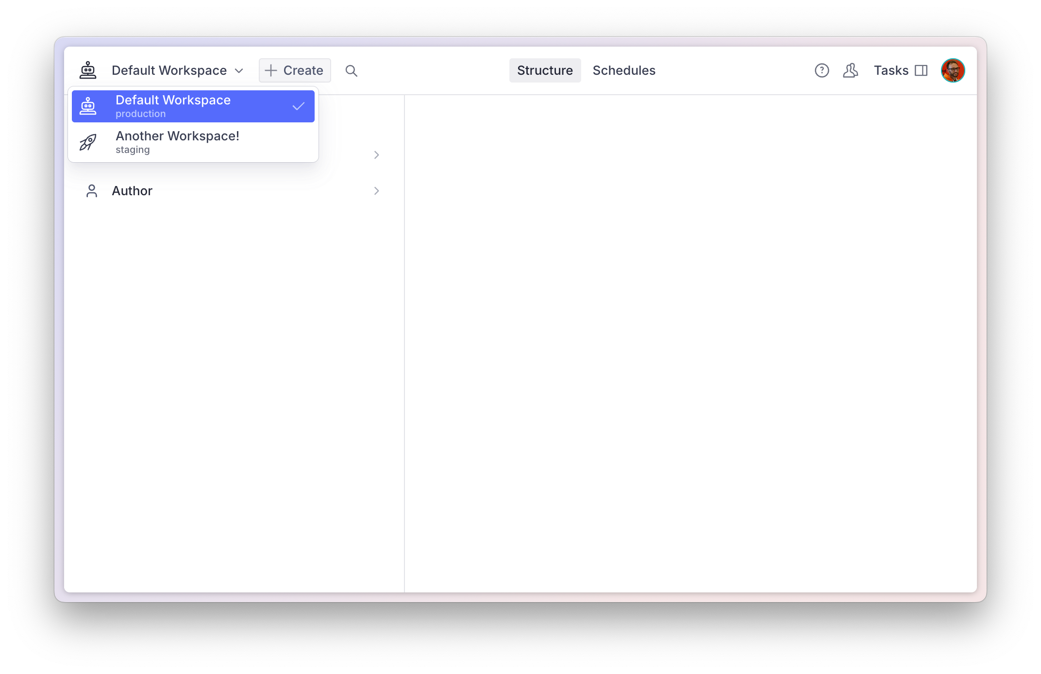 Shows an active popover menu next to the Studio title in the navbar. The menu lists two workspaces, with the first indicated as currently active.