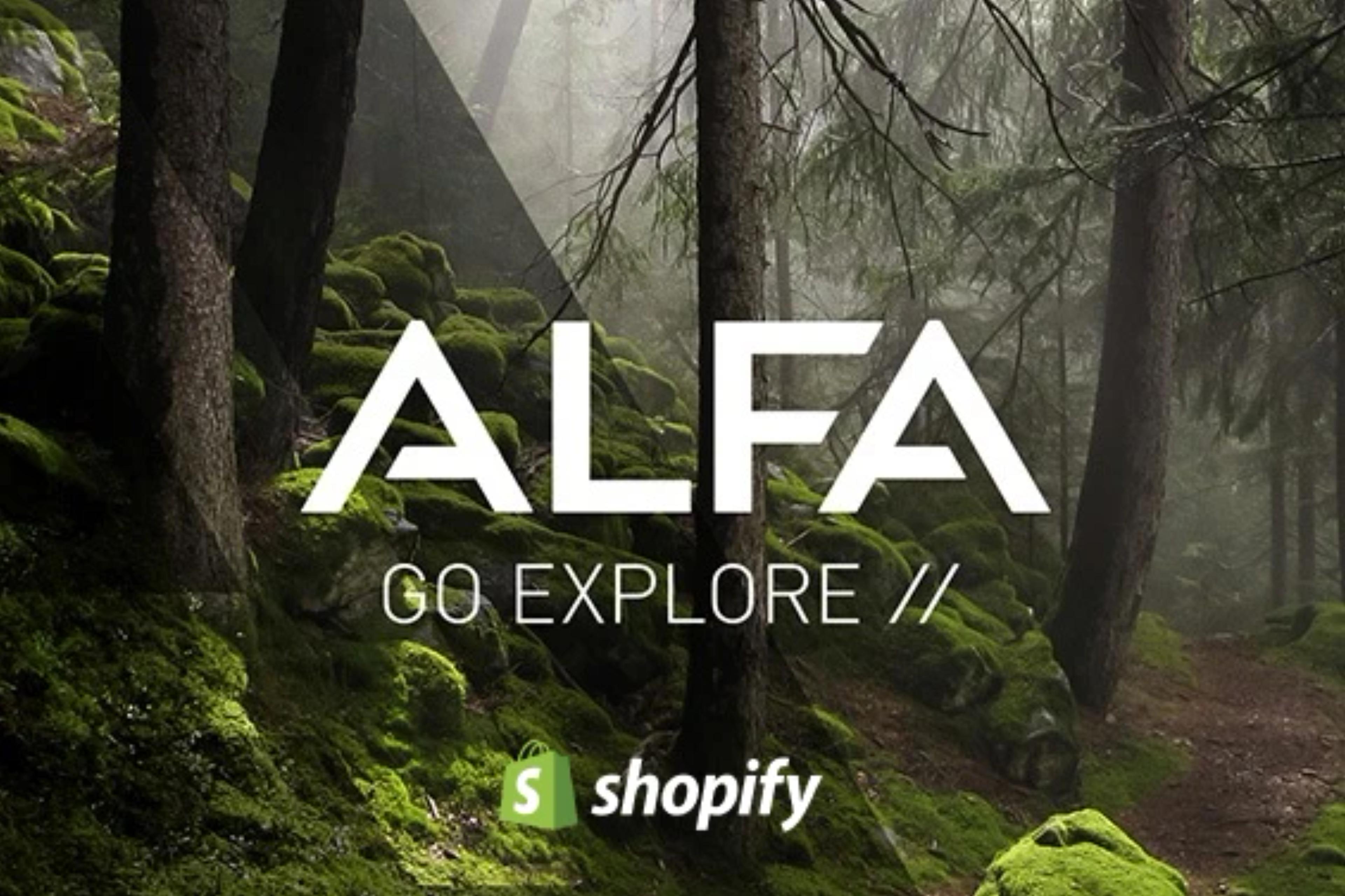a logo for alfa go explore with a forest in the background .