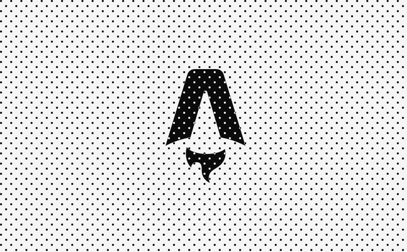 A stylized black letter A with a flame underneath, resembling a rocket, against a white background with a black polka dot pattern.