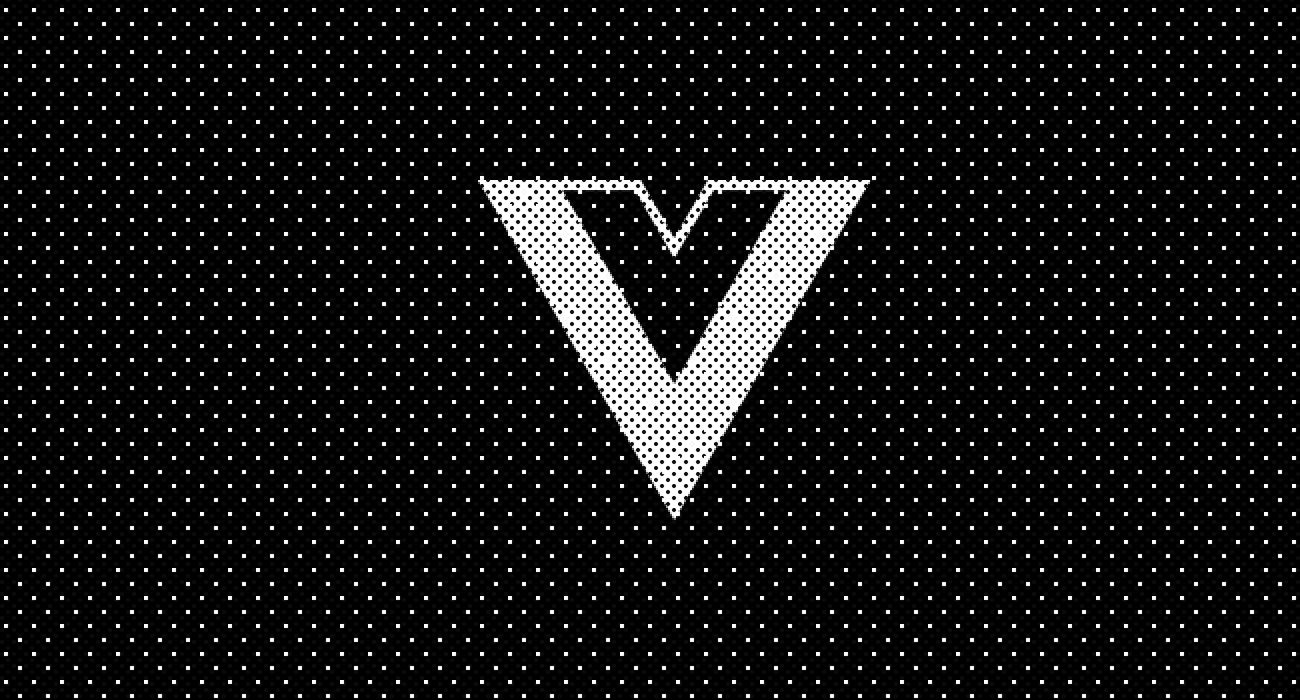 White dotted V with an inner inverted V on a black dotted background.