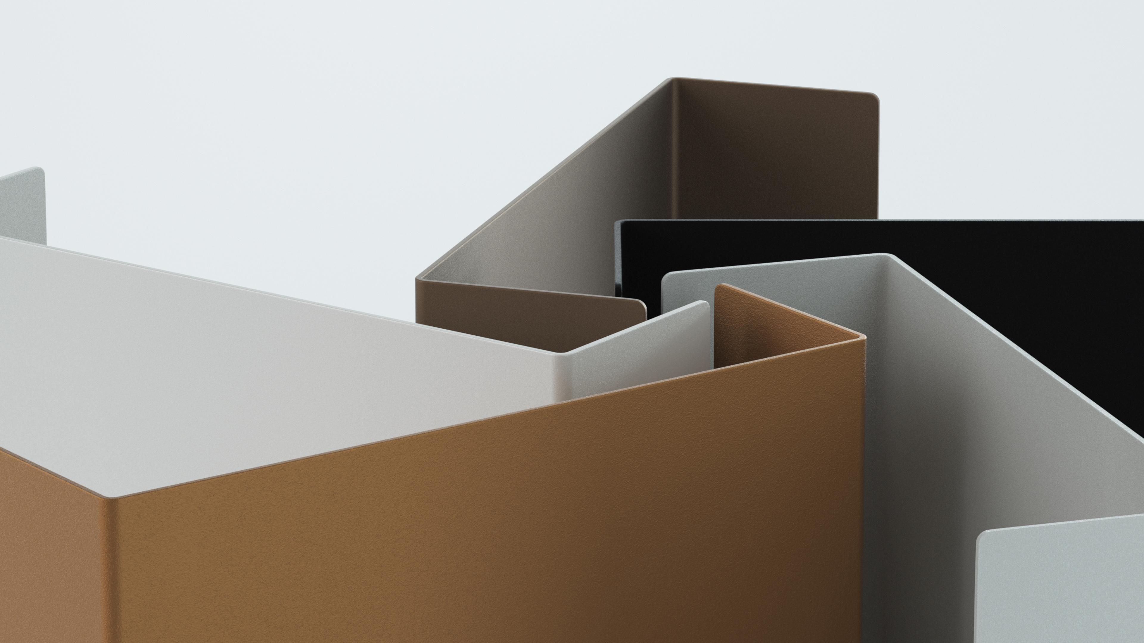 a close up of three different colored boxes on a white background .