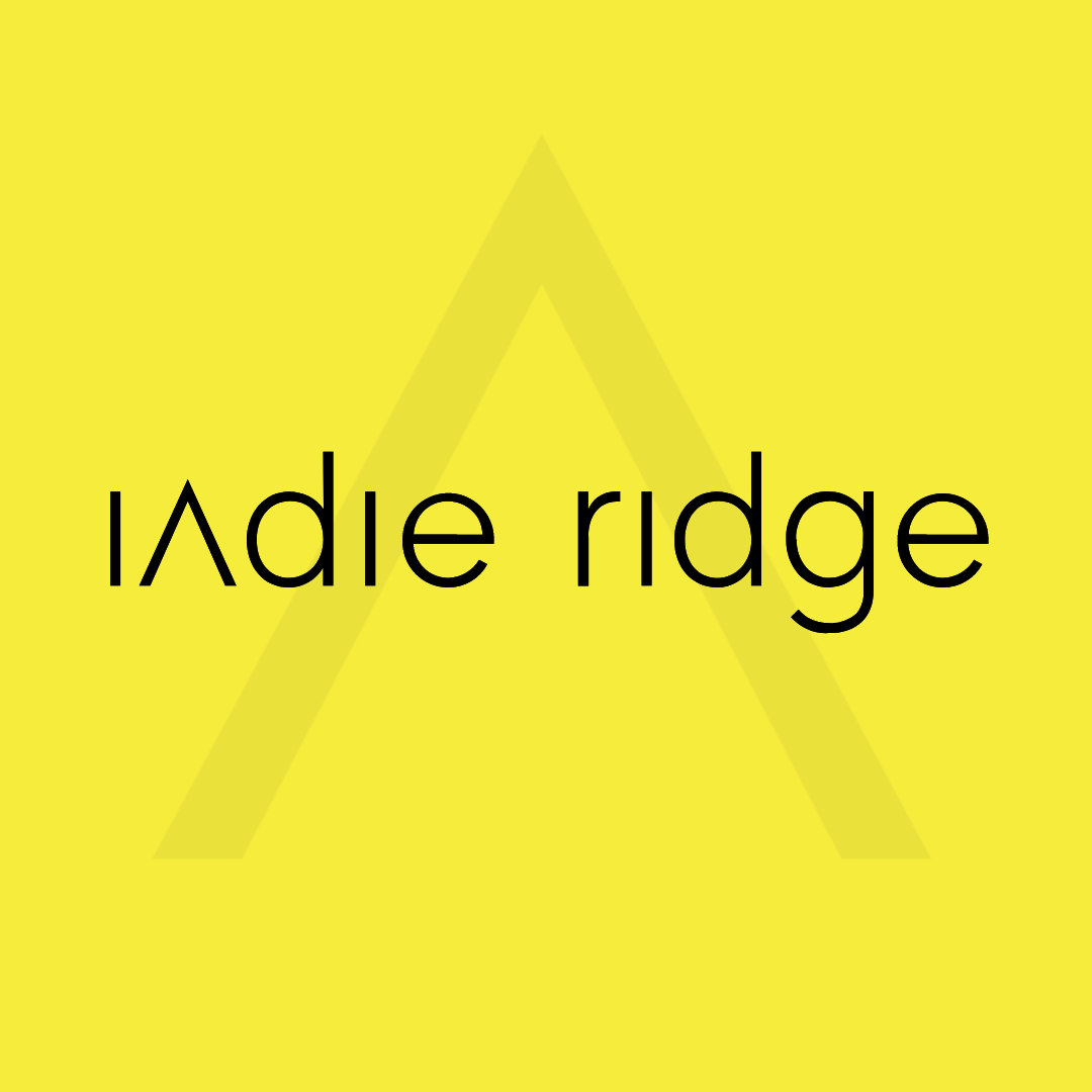 a logo for indie ridge on a yellow background