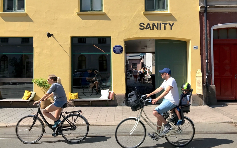 People on bikes outside of Sanity HQ