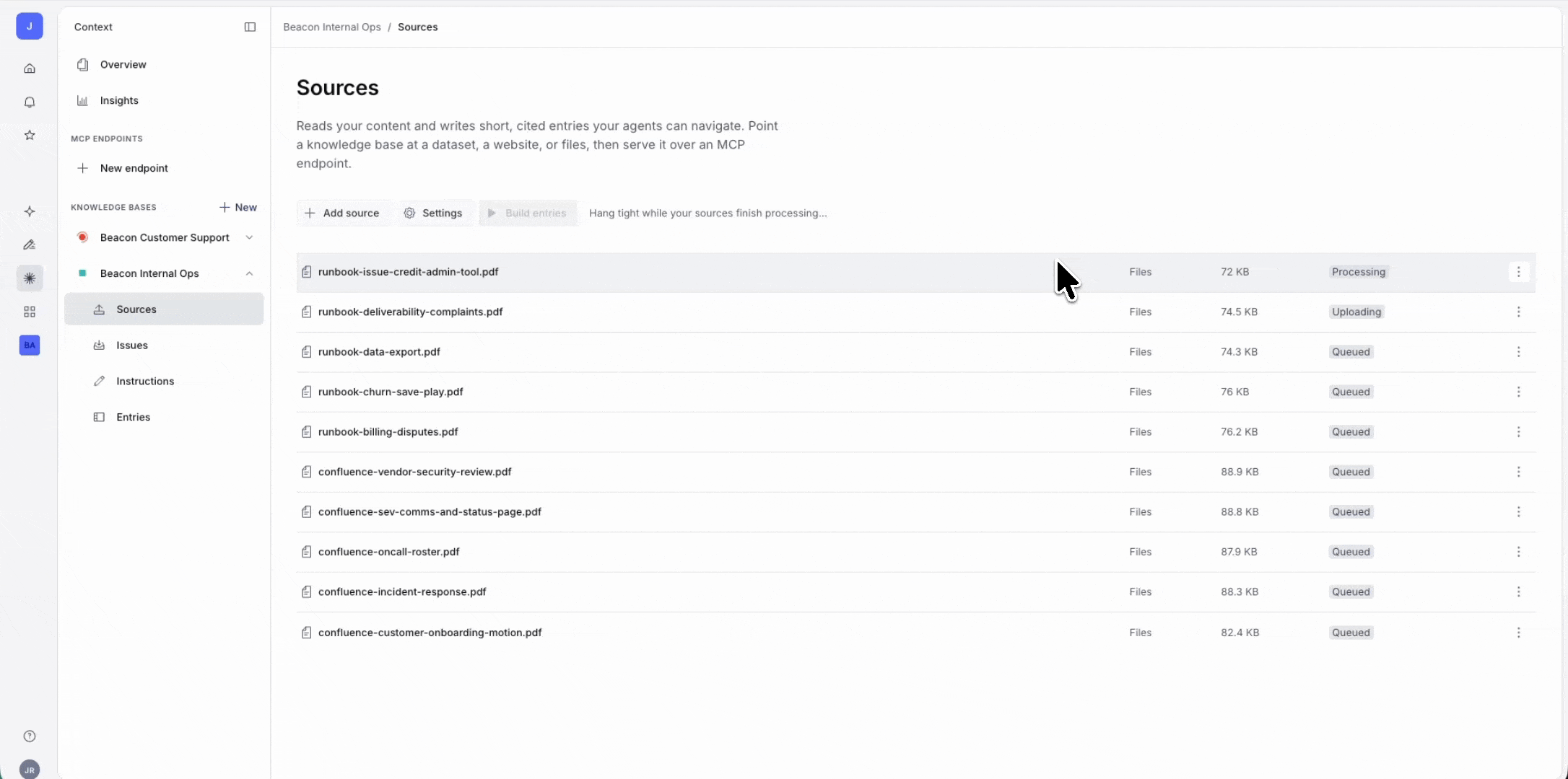 A user interface for 'Sources' showing a list of files being processed, uploaded, and built