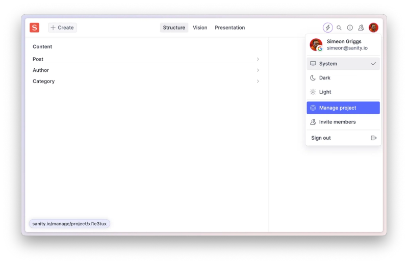 “Screenshot of a content management interface with options for ‘Content,’ ‘Post,’ ‘Author,’ and ‘Category’ listed on the left. The user profile dropdown on the top right shows ‘Simeon Griggs’ with options for ‘System,’ ‘Dark,’ and ‘Light’ themes, as well as ‘Manage project,’ ‘Invite members,’ and ‘Sign out.’”
