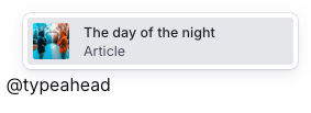 A typeahead suggestion for an article titled "The day of the night", with a thumbnail showing two people outdoors.