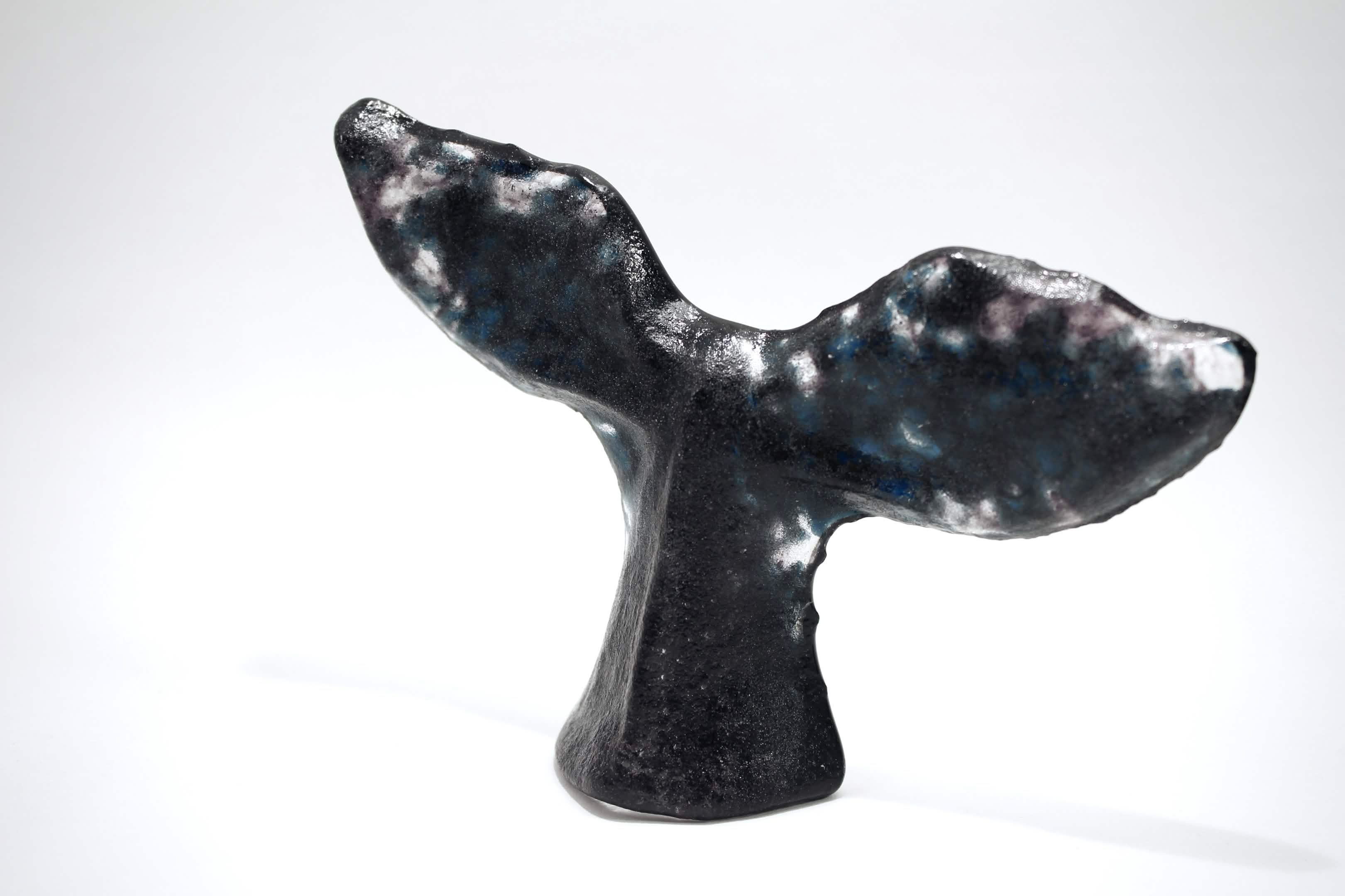 Whale tail sculpture