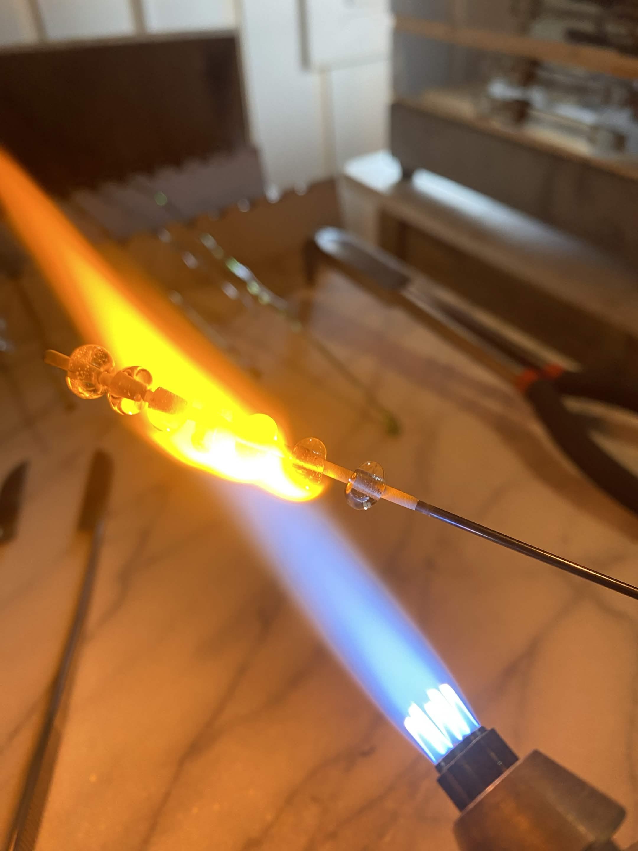 Glass being formed in flames 2