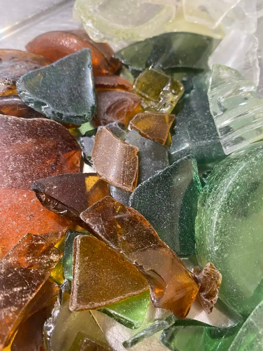 Broken colored glass pieces in various tone