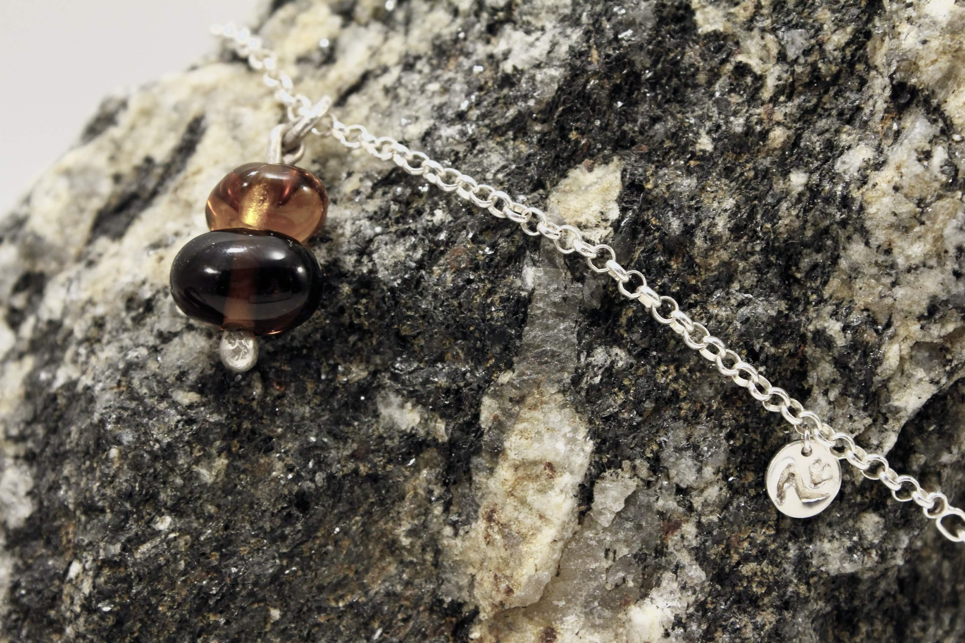 Necklace placed on a stone