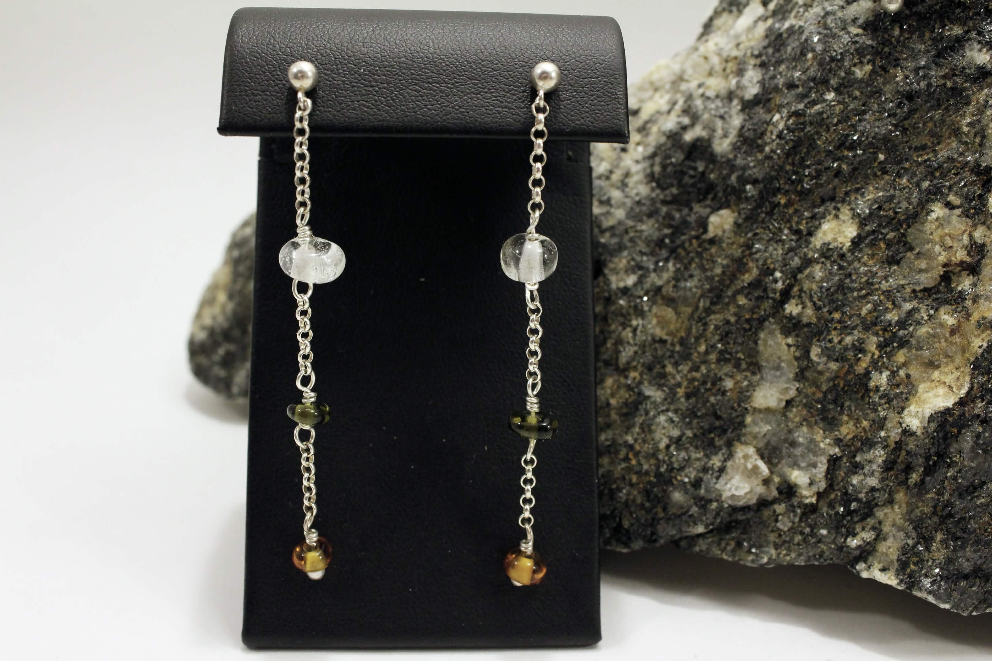 A long pair of earrings