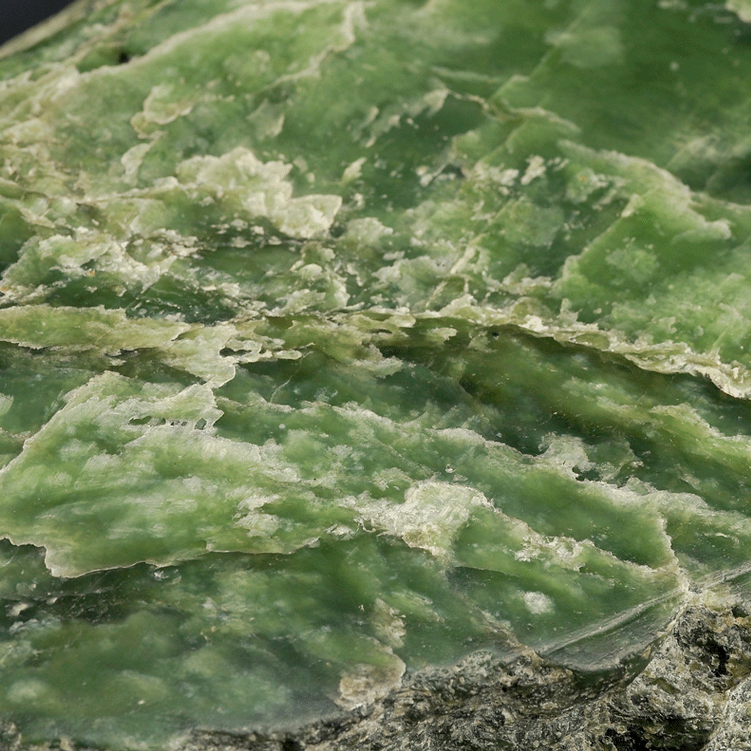 Detail of pounamu kōhatu (boulder), kawakawa variety. Museum of New Zealand Te Papa Tongarewa (ME024004)