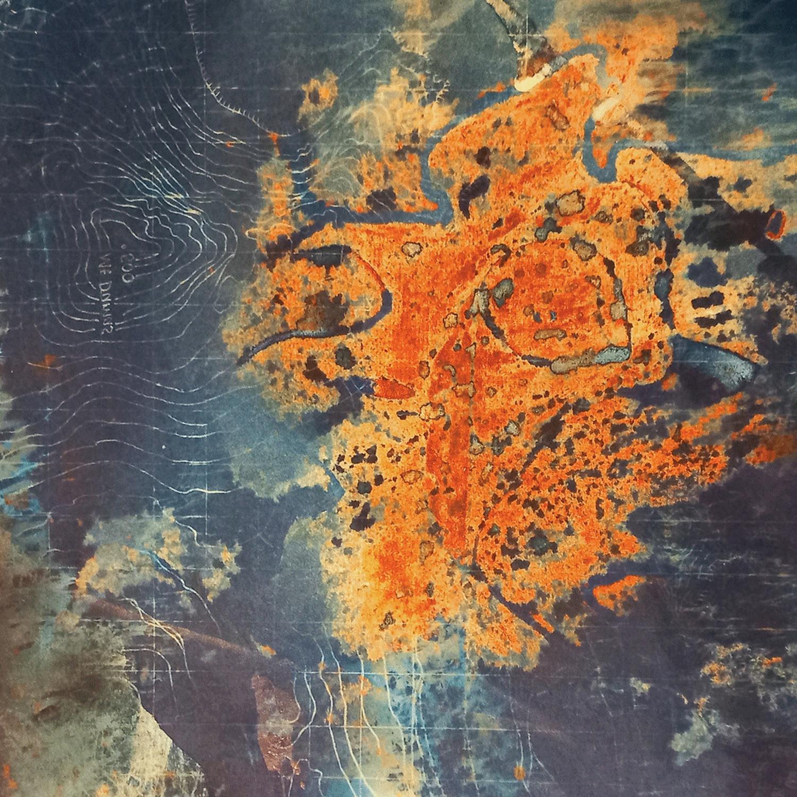 Kathy Reilly’s print Wayfinding, with fiery orange forms over deep blue and green textures, like an aerial view of land.