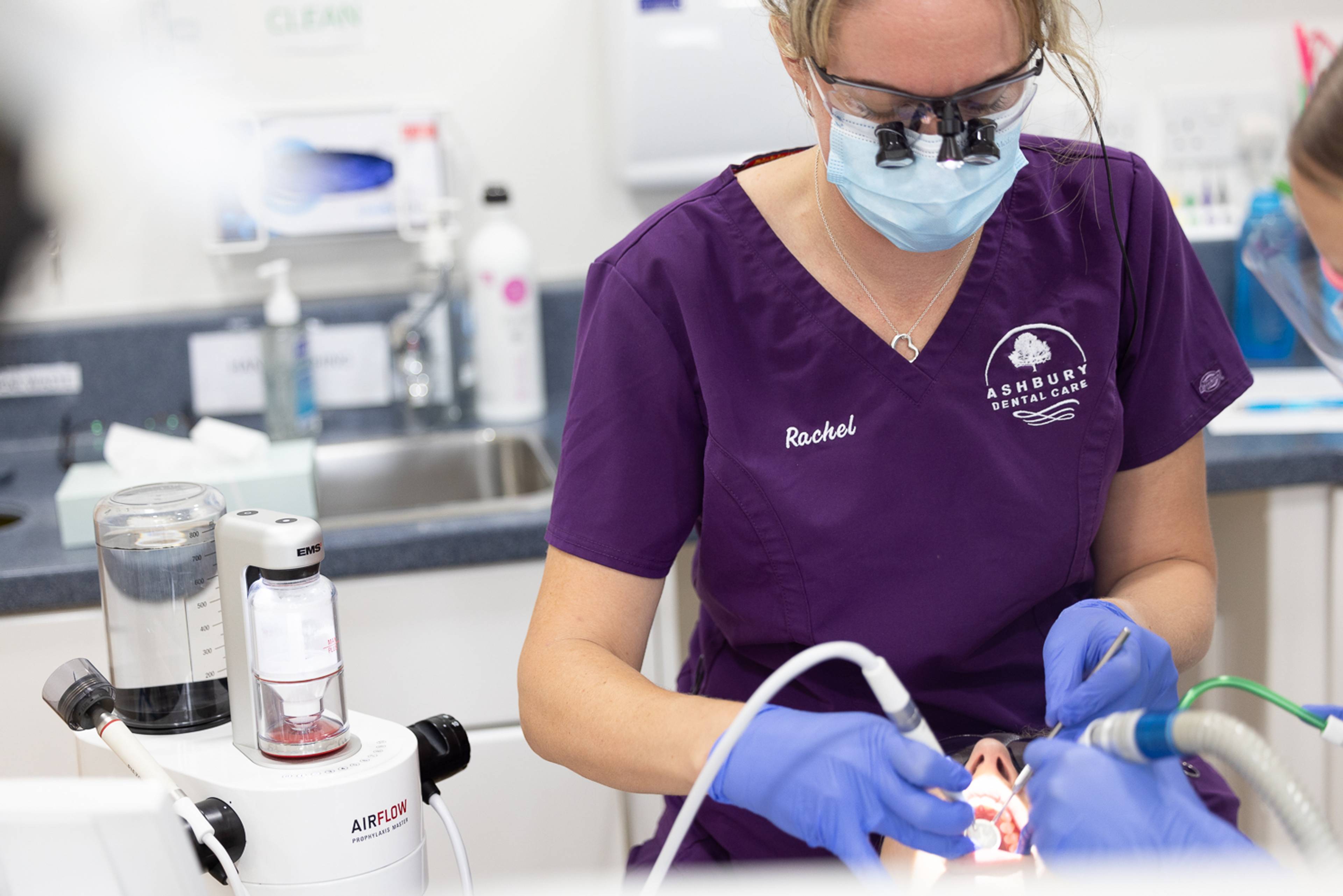 Dentists working on a patient at Ashbury Dental Care