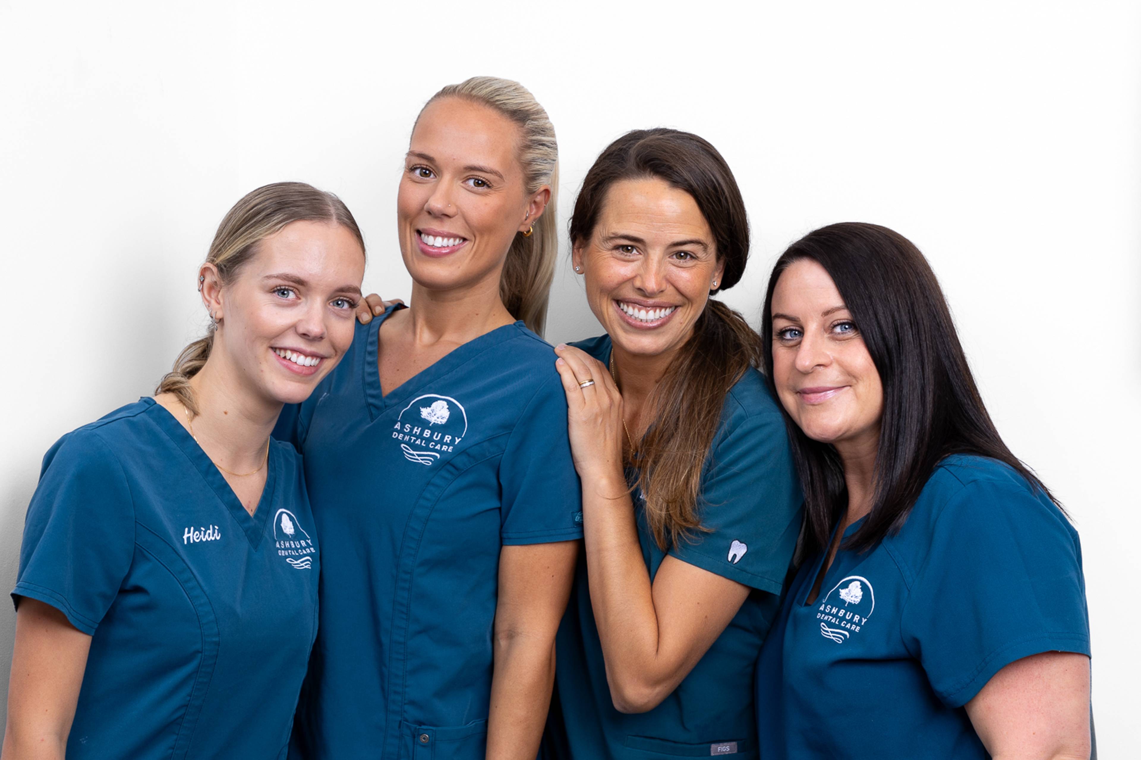 Smiling team of dentists at Ashbury Dental Care