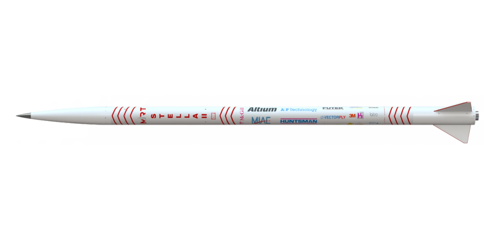 A full-length rendering of a white rocket, "MRT STELLAH" written vertically along its side in red letters. Below the letters, there are several sponsor logos. The rocket has a pointed nose cone and three fins at its base.