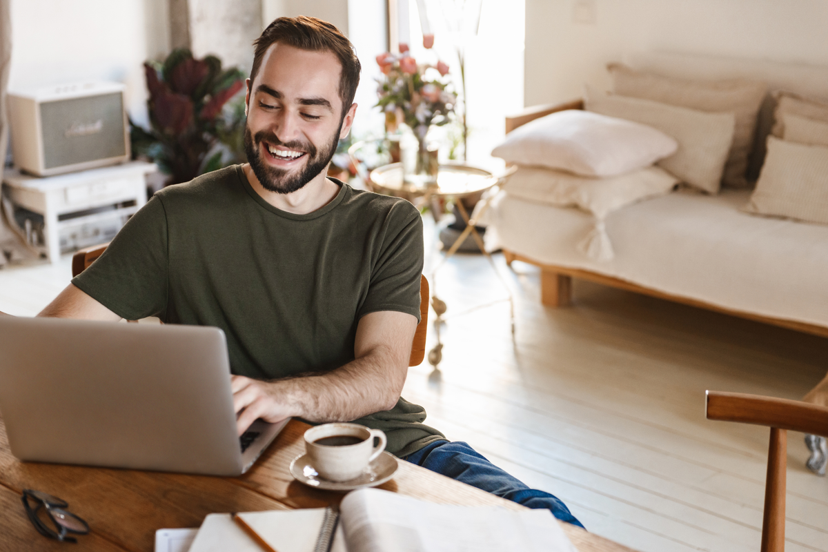 A small business owner working remotely while a managed service provider monitors and maintains their IT systems