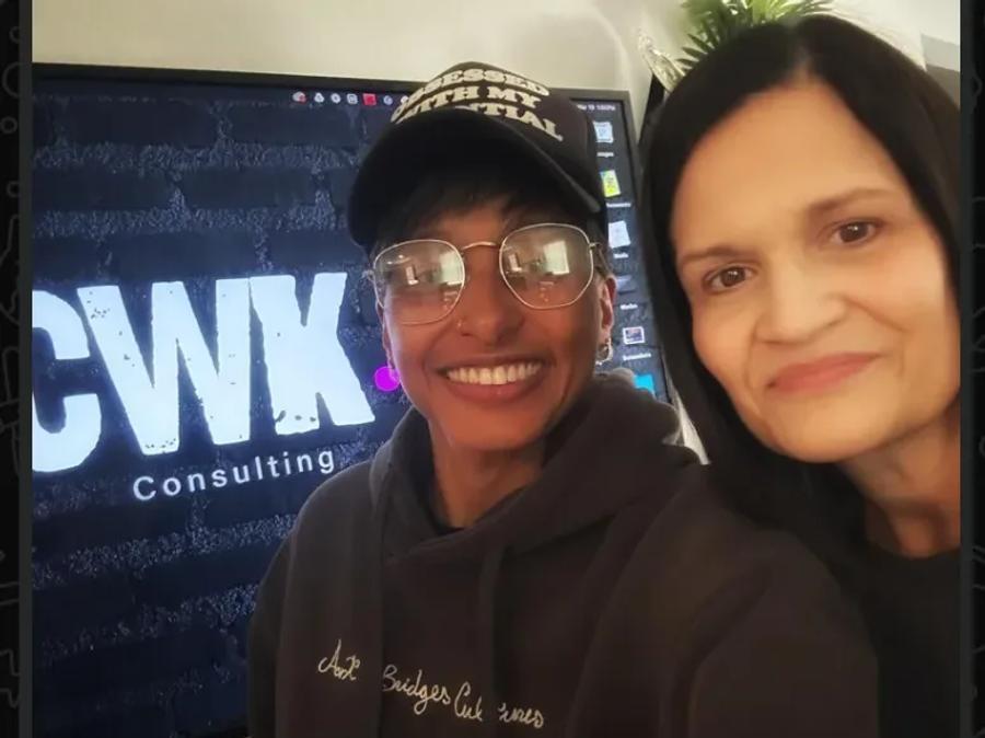 Titi Lee with Kris in front of CWK Consulting screen, sharing thanks for Life's Tapestry