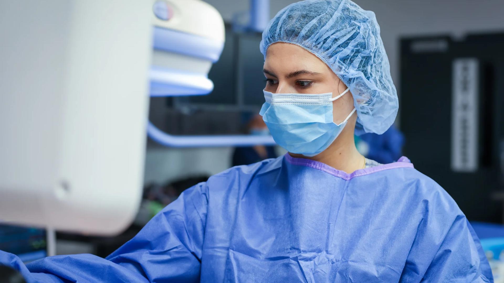 Clinician reviewing patient monitoring data at Synchrony Labs