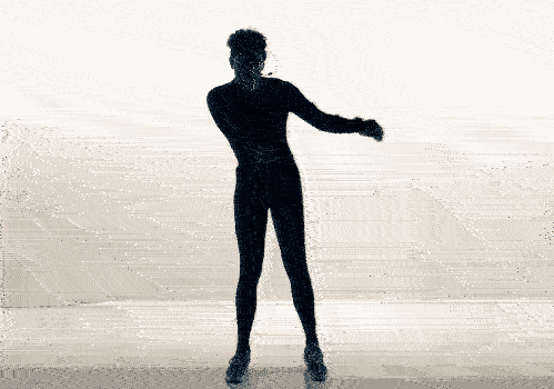 Silhouette of a person standing with one arm extended