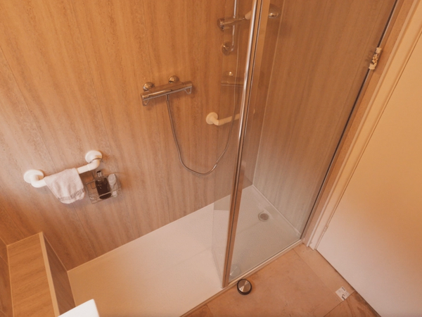 A walk-in shower fitted in place of an old bath