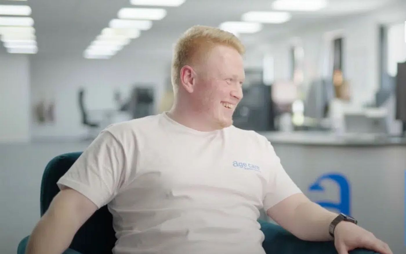 Sam, founder of Age Care, in the office