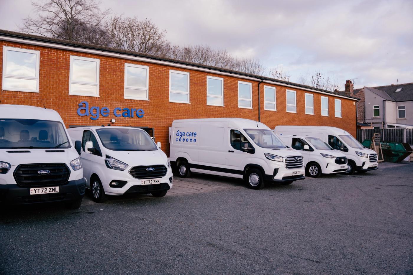Age Care's fleet of branded vans outside the head office