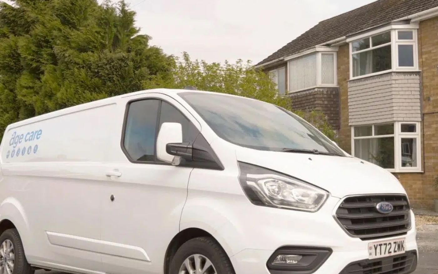 An Age Care van outside a customer's home