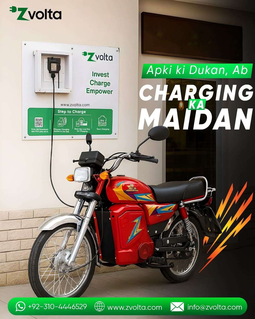 Red electric motorcycle charging from a Zvolta wall charger outside a shop