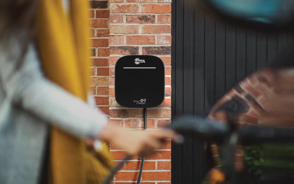 The CITA Smart Eco installed and charging an electric car