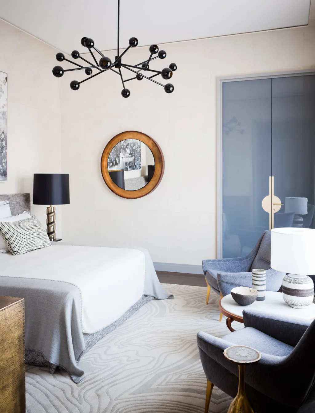 Light bedroom with grey chairs and a branching black ceiling light, Jean Louis Deniot, Paris