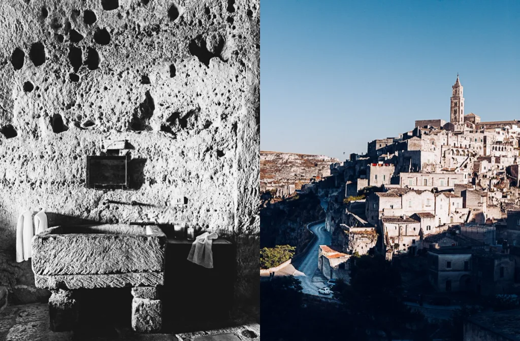 Carved stone washbasin beside a view of Matera's hillside skyline, Sextantio Hotel, Matera