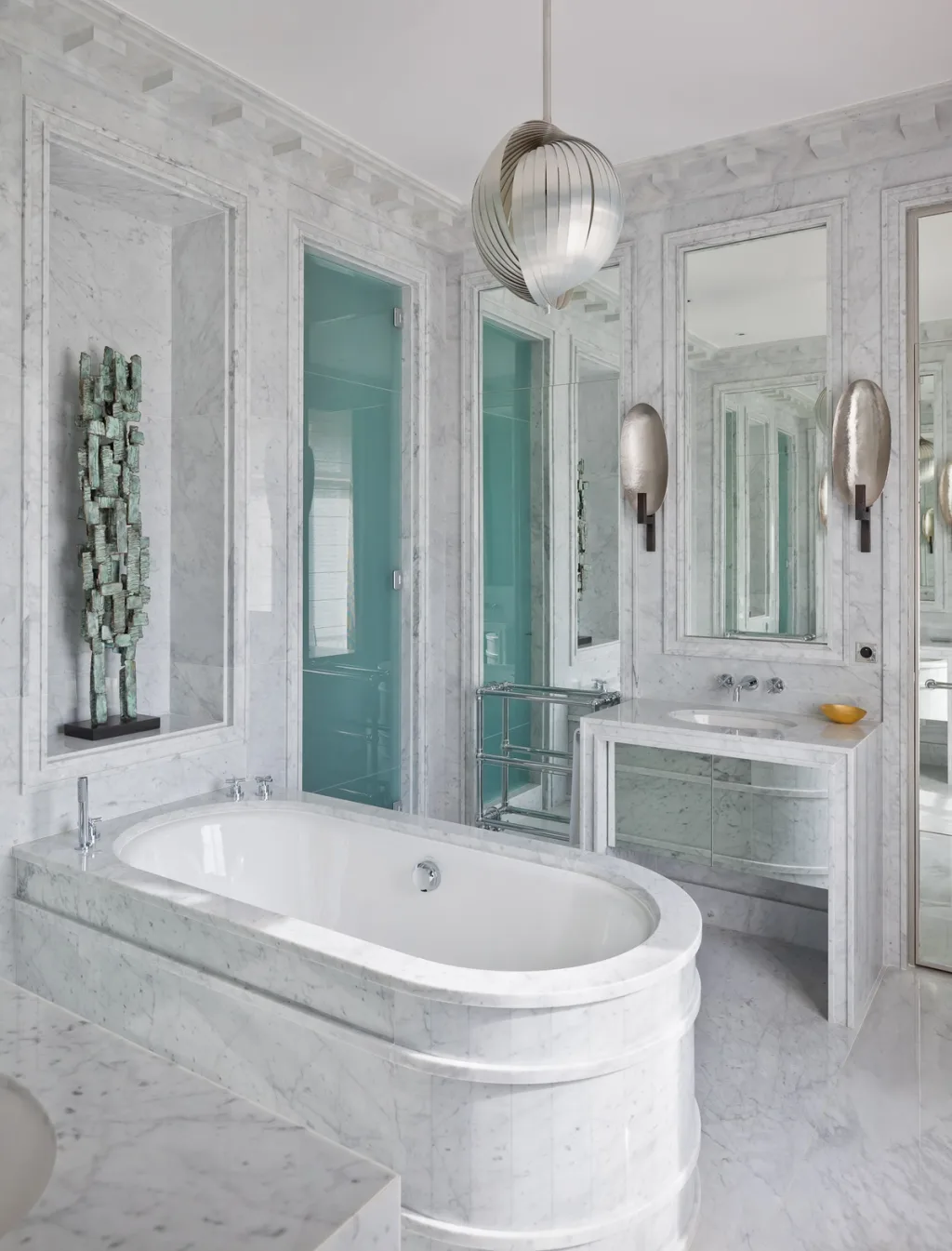 Pale veined bathroom with an oval tub and turquoise shower door, Jean Louis Deniot, Paris