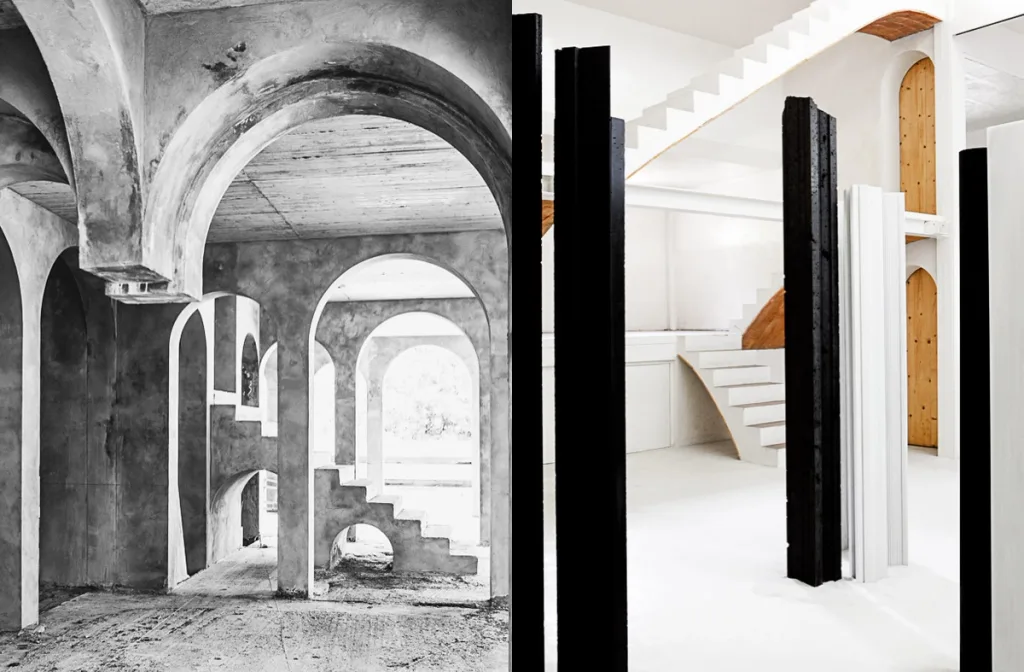 Raw arched passage paired with white stairs and dark vertical sculptures, Xavier Corbero series