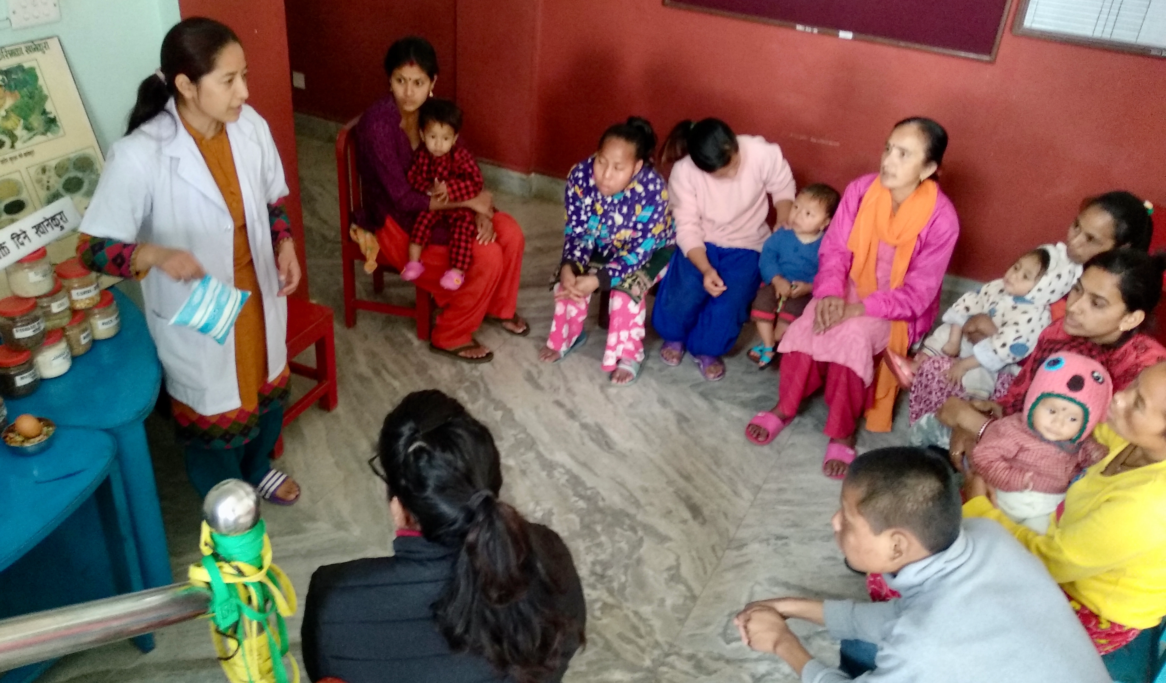 A nurse advises parents at the Nutrition Rehabilitation Home in the Kathmandu VAlley.
