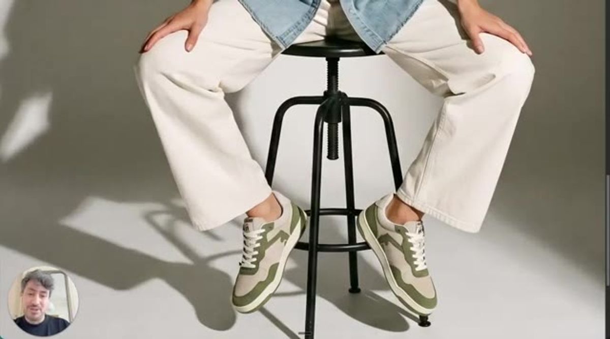 the green and white sneaker the workflow was built to reproduce, in a studio product shot