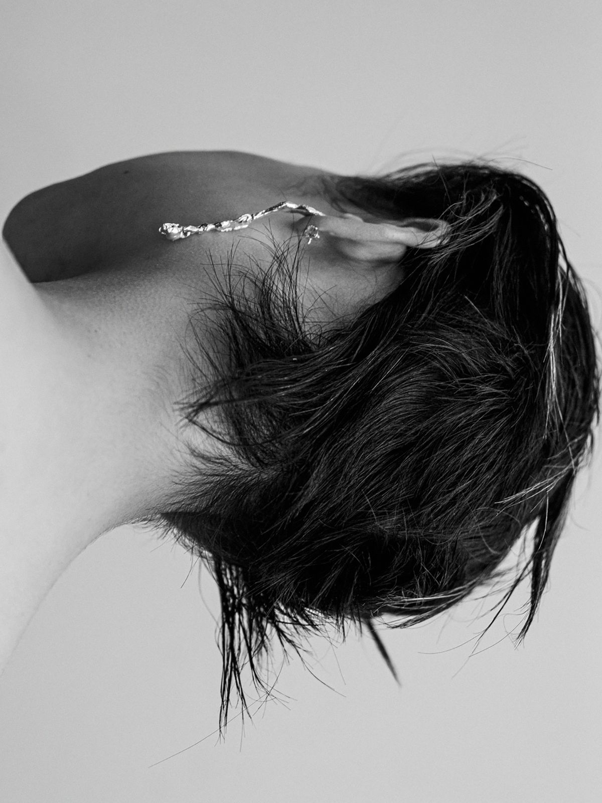 back of head shot of a women with black hair