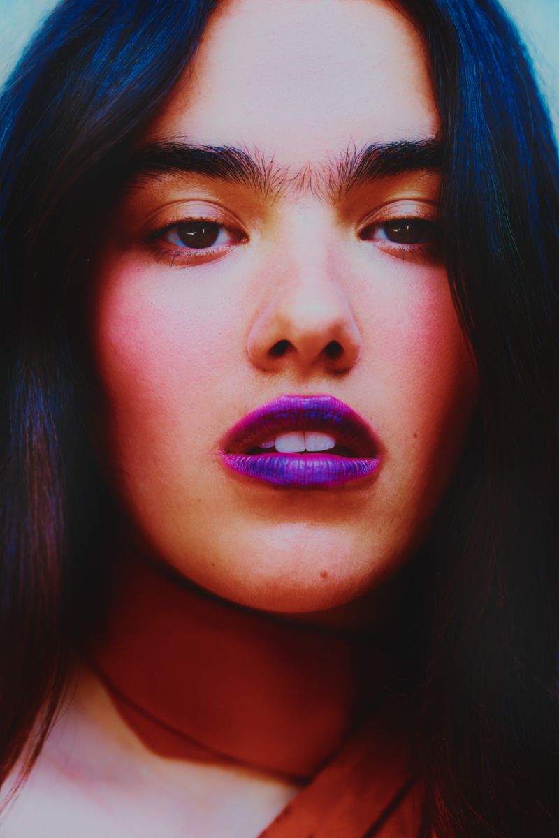 close up of model with purple lips