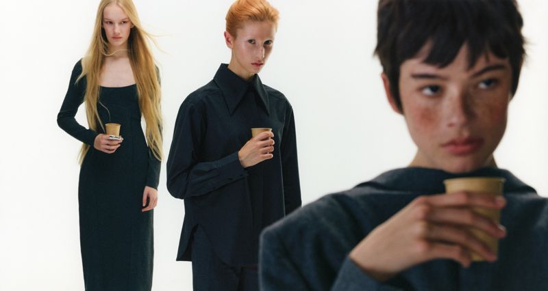 3 models drinking coffee at various depths of field on a white backdrop