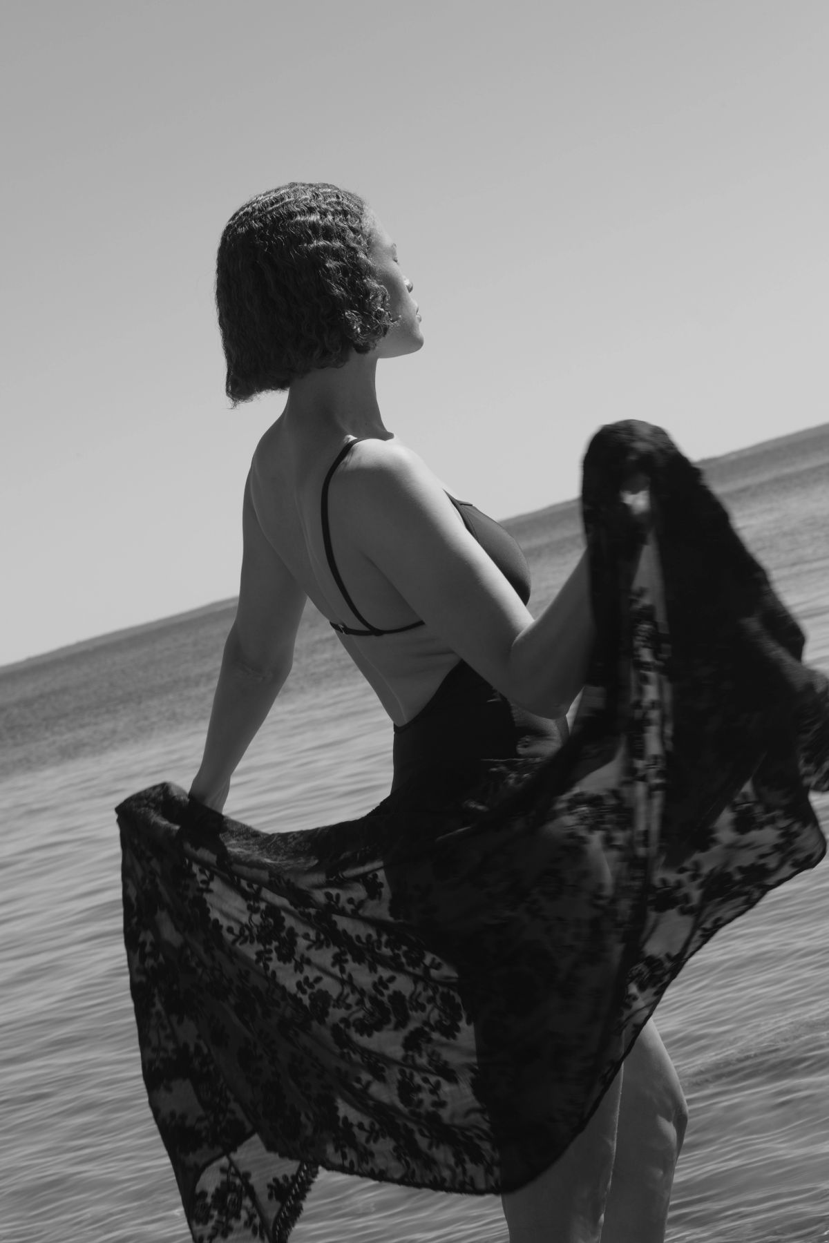 women moving in the water with swimsuit 02