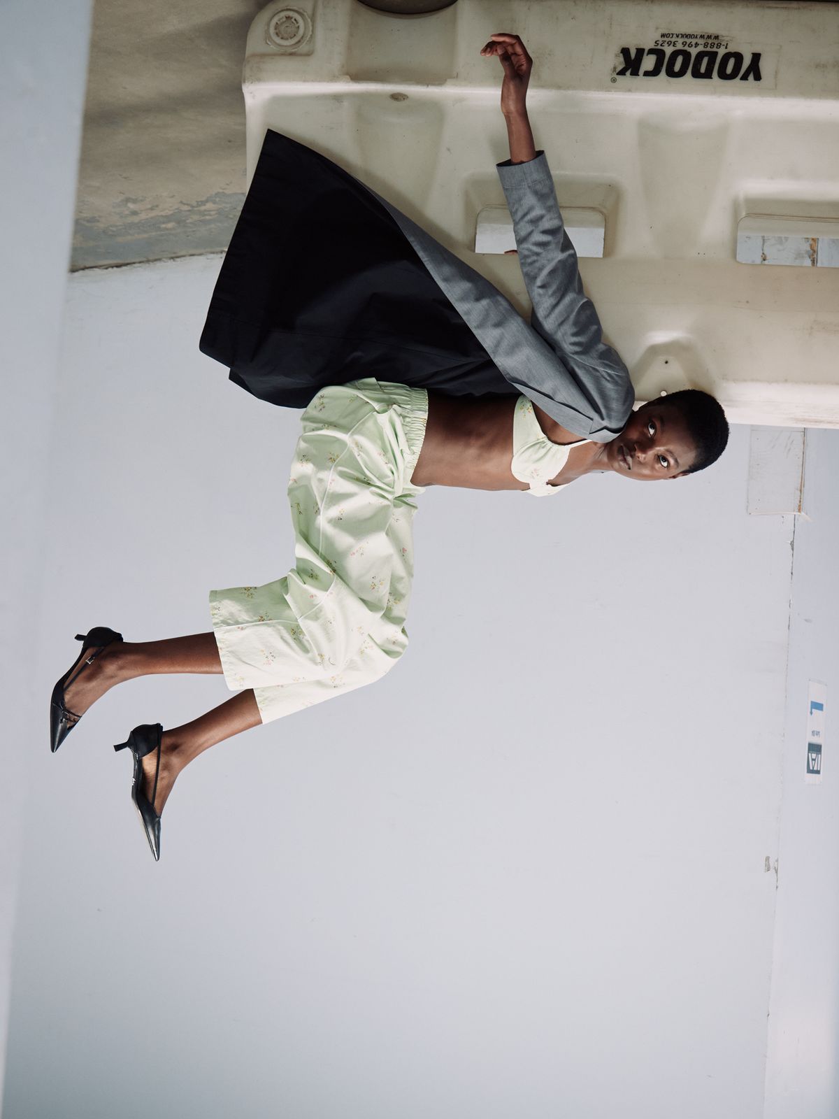 Model upside down on some construction furniture