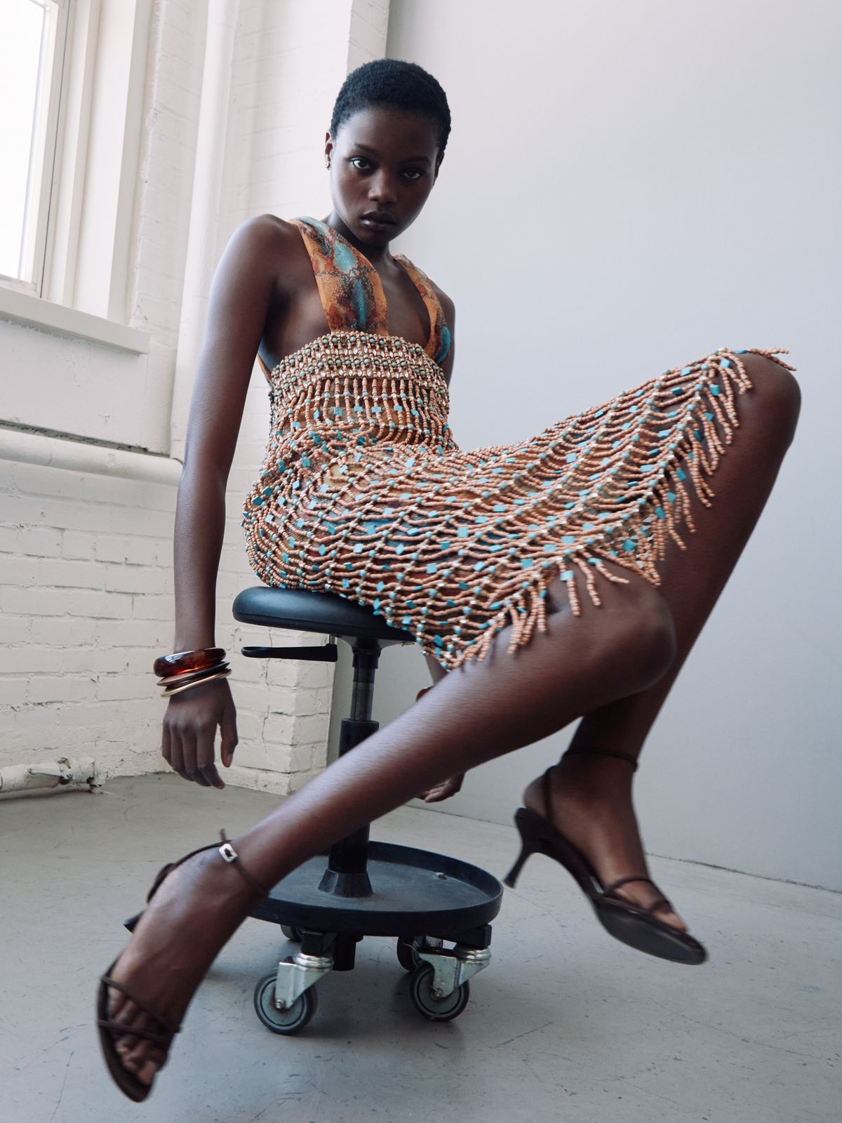 Women spinning on a chair