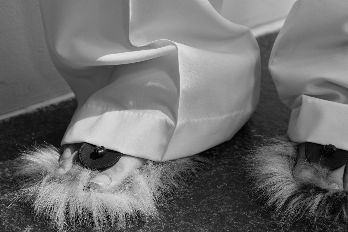 womans feet in furry shoes 