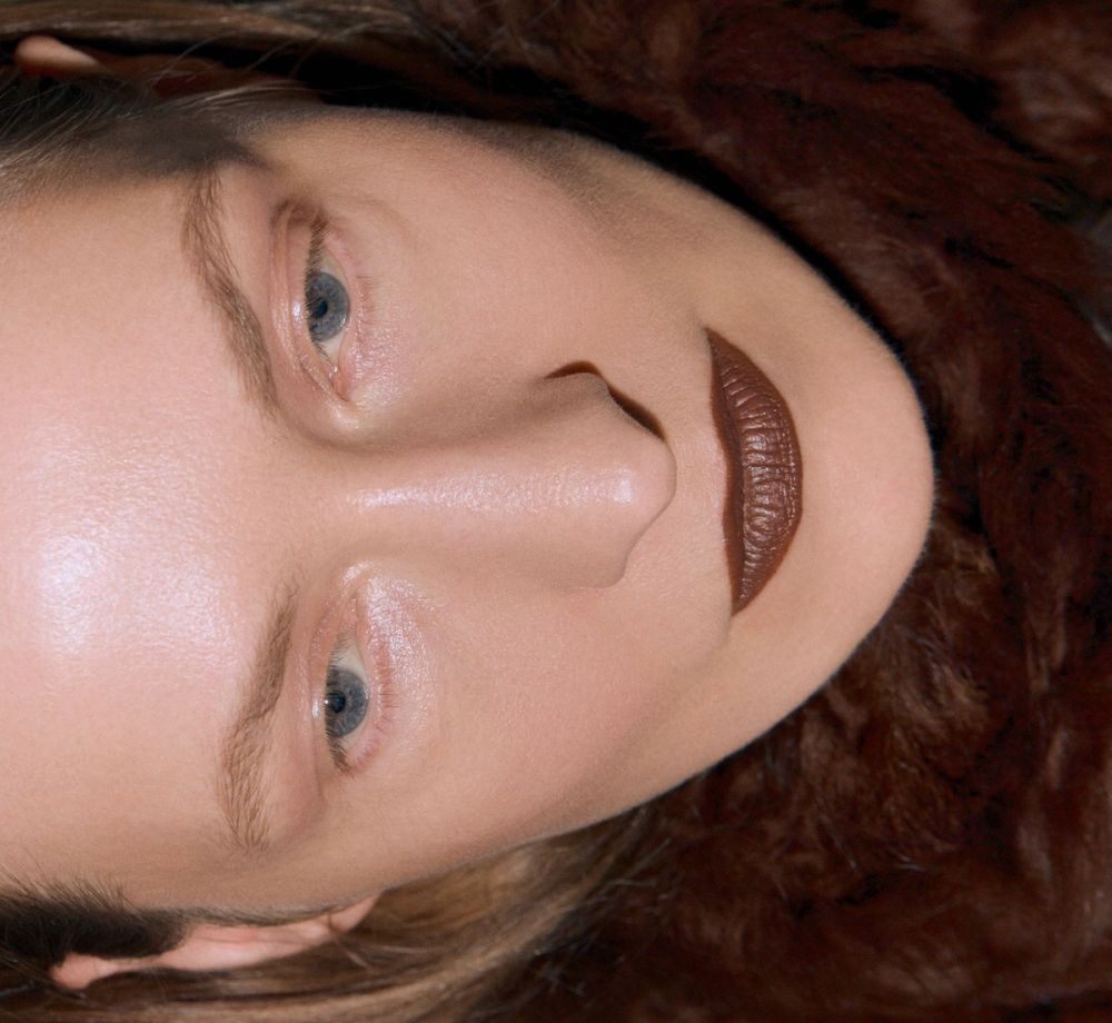 brown lips and glossy skin