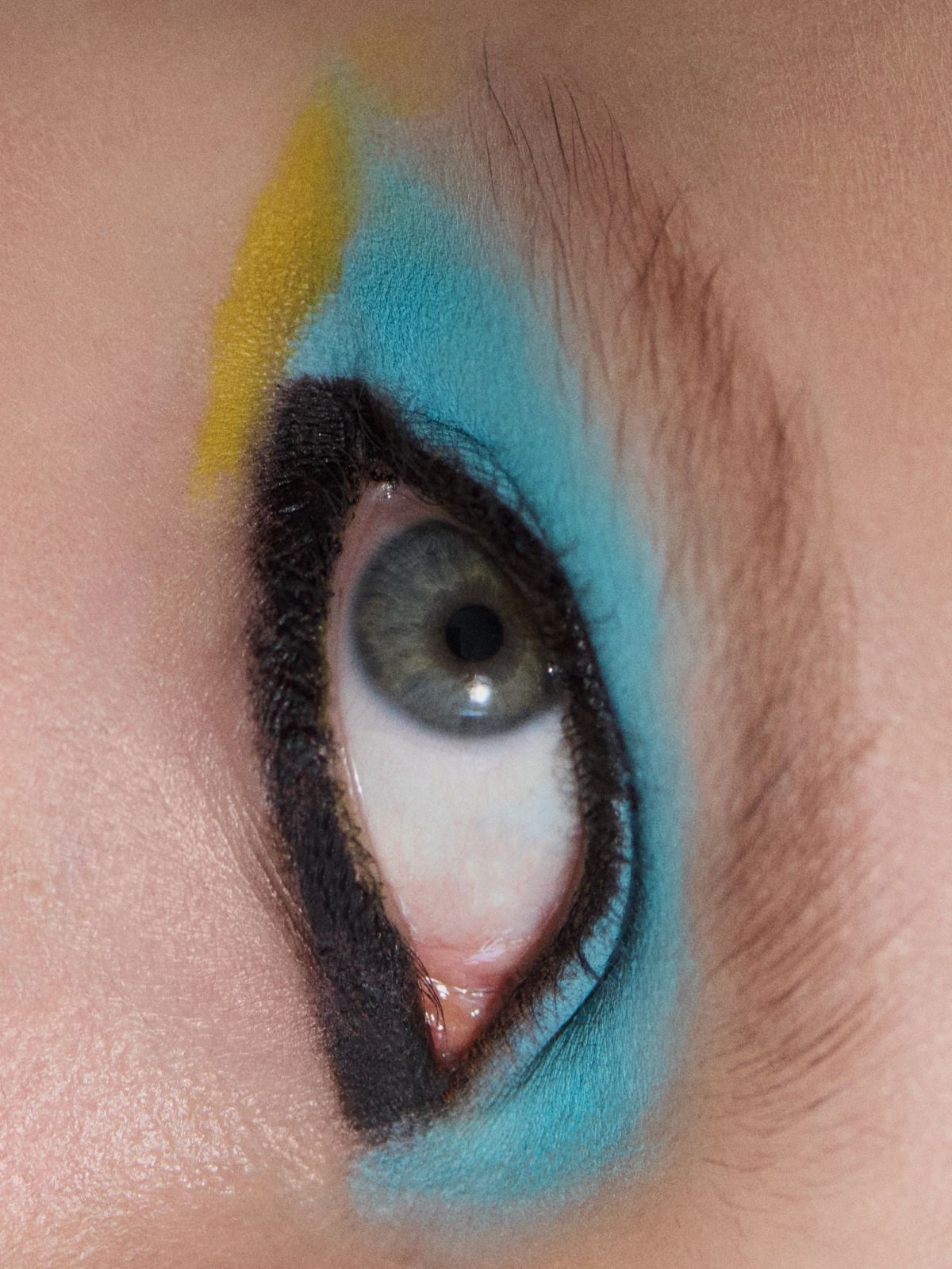 eye roll with blue eye shadow