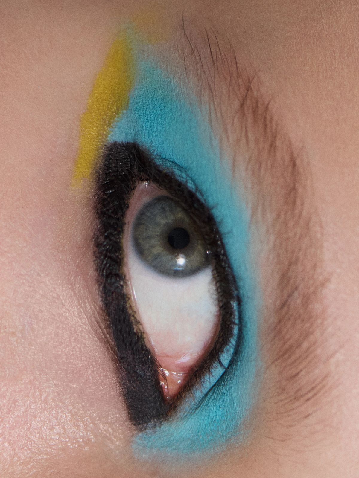 eye roll with blue eye shadow