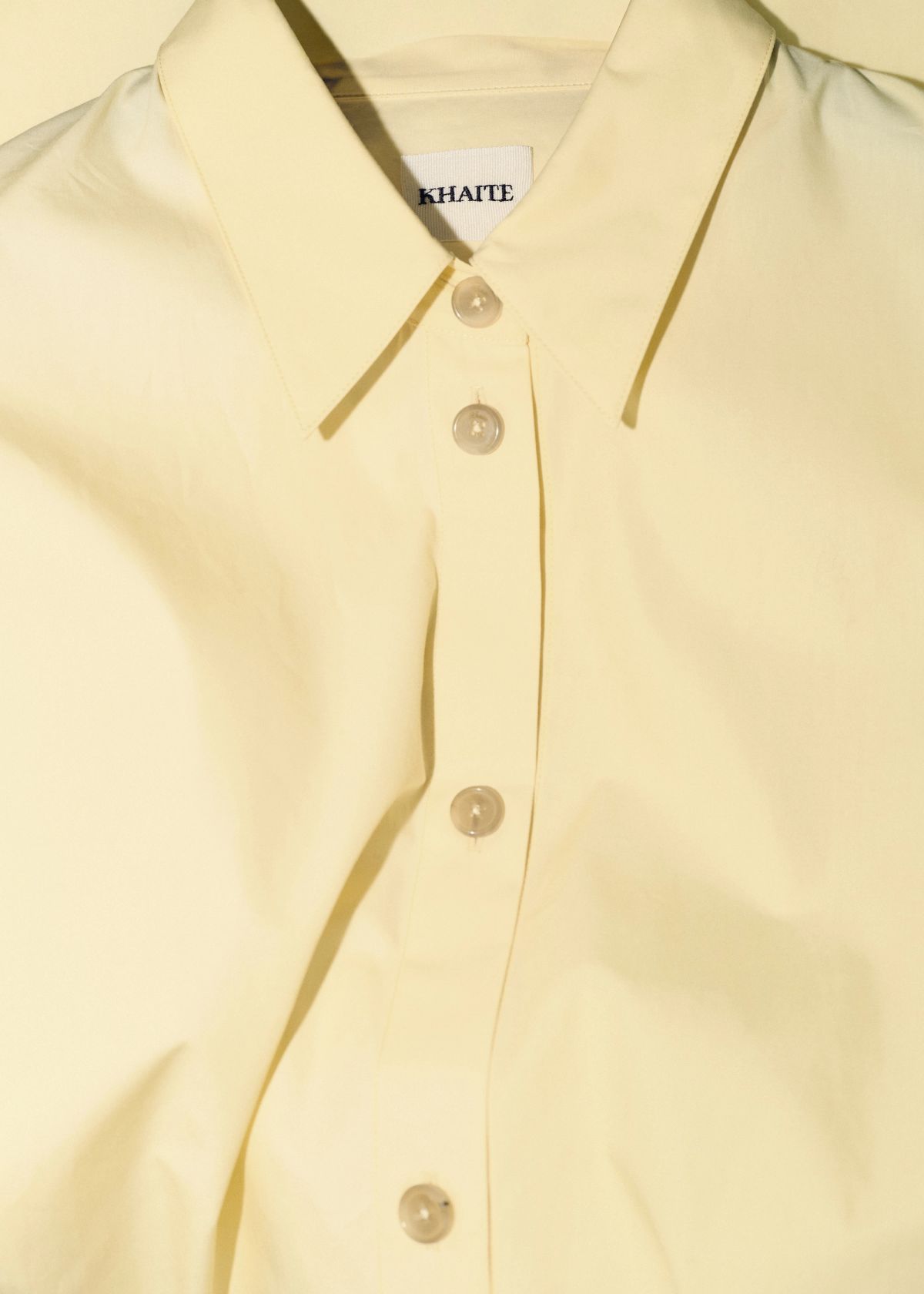 still life image of yellow shirt